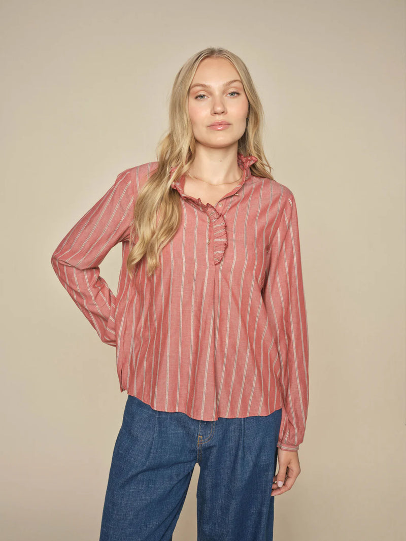 from Mos Mosh. Elegant blouse, designed in a regular fit with charming frill detailing along the neckline and placket. Crafted from a stunning fabric adorned with shimmering stripes that catch the light beautifully.