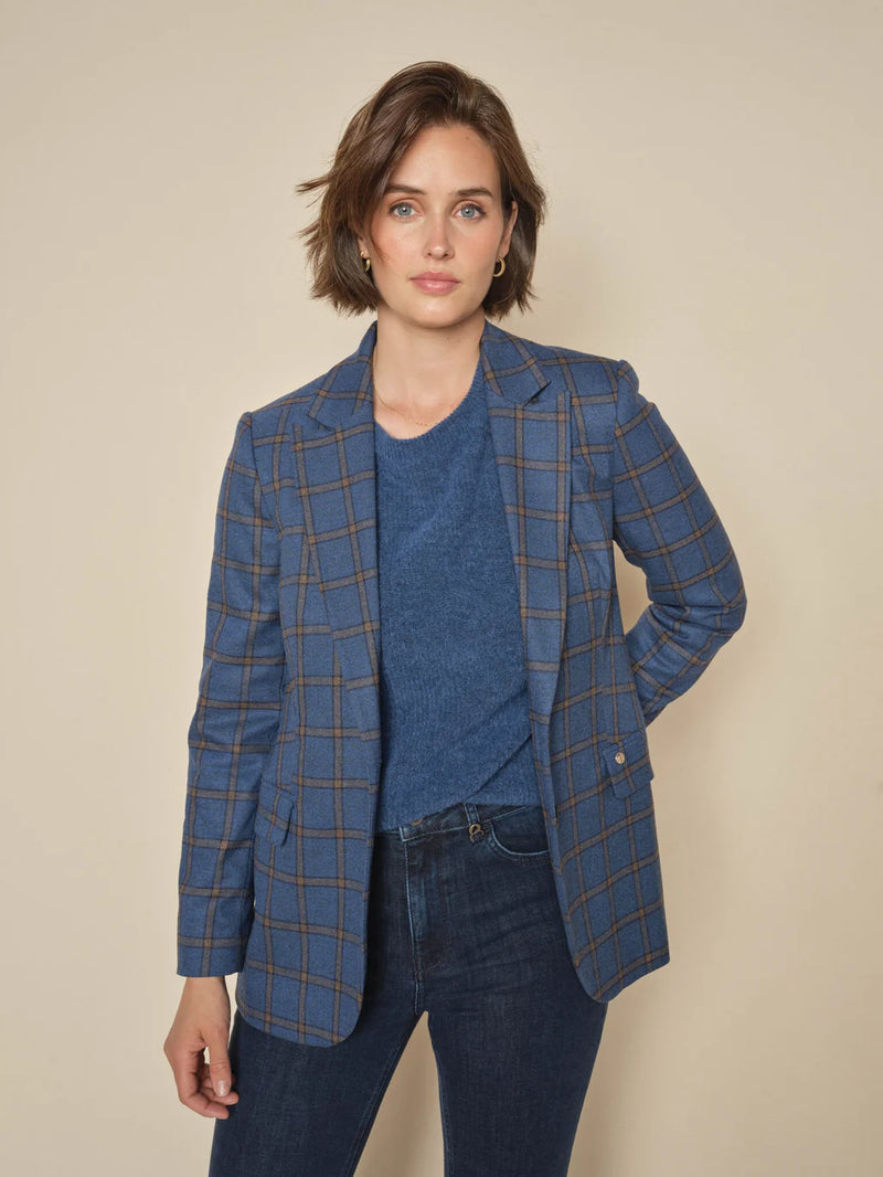 from Mos Mosh, Elegant check blazer, tailored in a relaxed, elongated silhouette. Featuring double-button closure, rounded hem, and flap pockets. Versatile enough to elevate any jeans-and-tee outfit with effortless style.