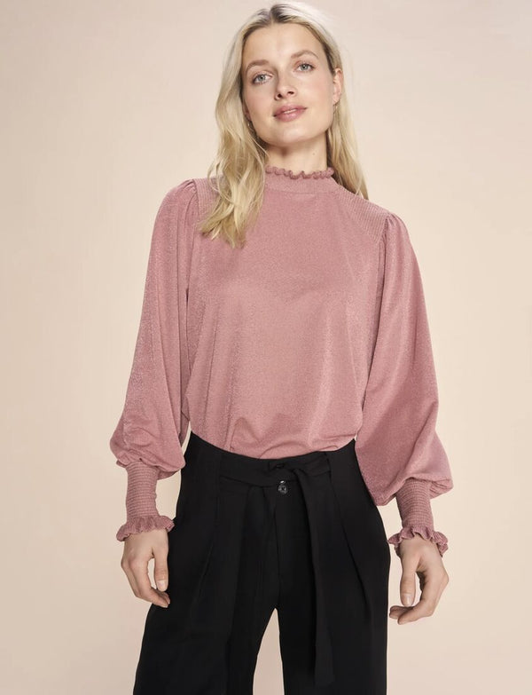 Kaliva blouse This stunning blouse is designed in a regular silhouette and crafted from a viscose-lurex blend. It has ruffles at the neck and billow sleeves ending in cuffs with a smock effect, structured details, and ruffles. 