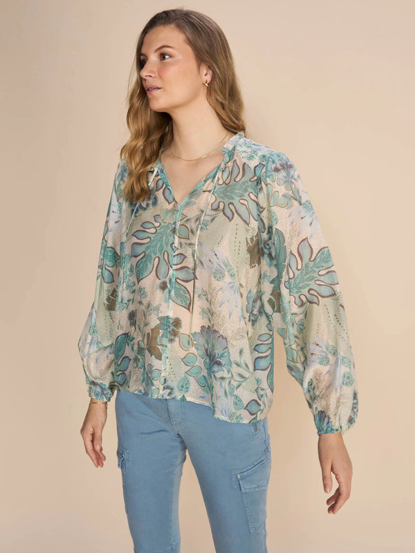 Mos Mosh Eisa Sarasa blouse. This trendy and flattering blouse is crafted in a floral print.  Front draw string neck line with elastic detail at wrists.Light weight feminine comfortable fabric.