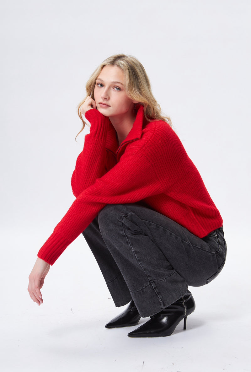 Red sweater with a front zipped collar.  Very soft knit