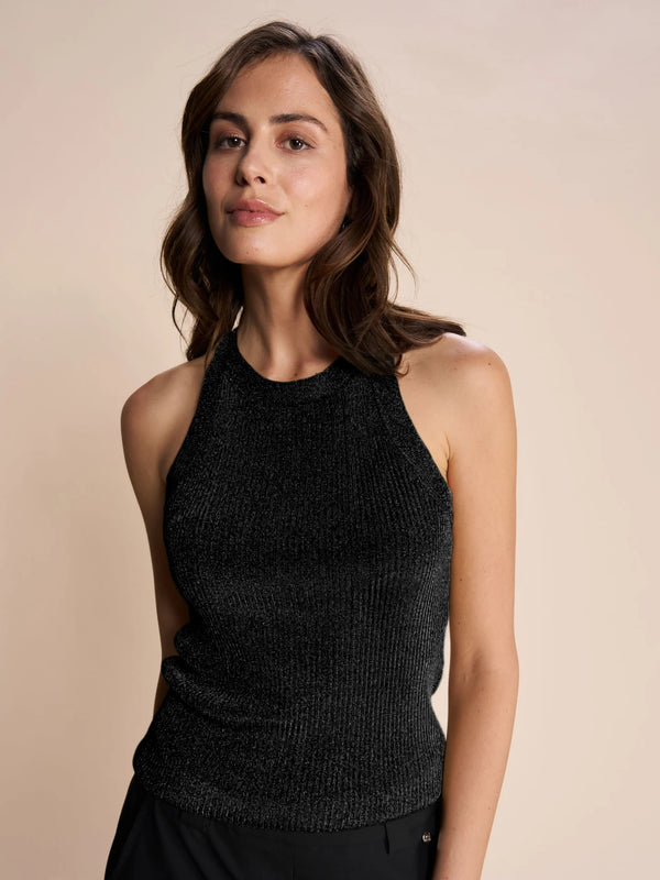 Black sleeveless stetchy ribbed top in a mix a stunning lurex blend. Wear with a jeans or a chic skirt or pant. Perfect going out top  