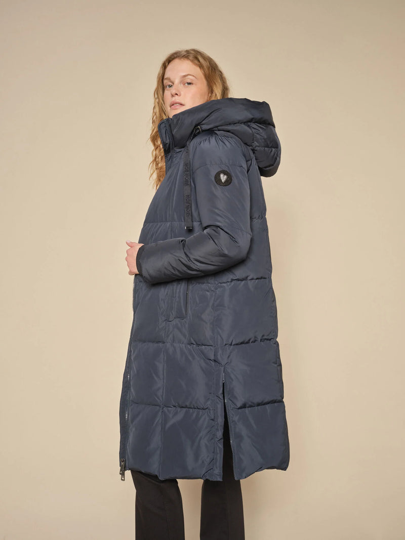 this coat will become your favorite coat.  Warm and sylish.  The heavy zipper can be opened from the bottom, allowing more flexibility when you move. Available in navy at REDVELVET clothing for women.